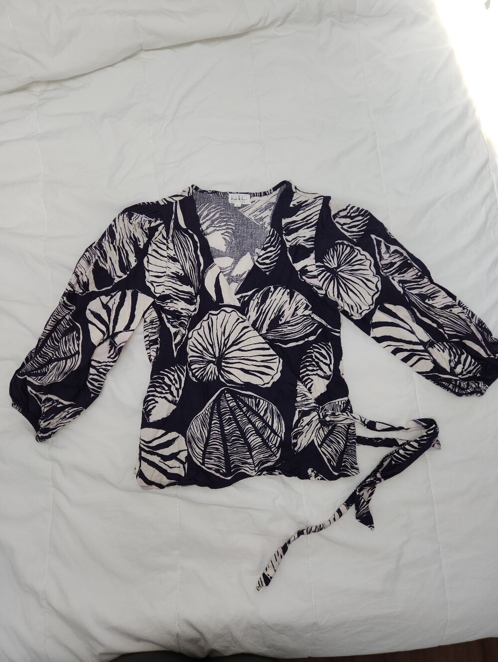 Nicole Miller Patterned Wrap Top